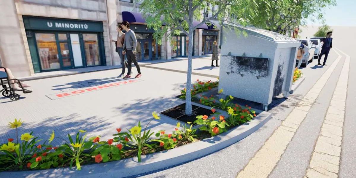 Modern bir şehir caddesinin dijital tasarımını gösteren görselde, kaldırım üzerinde yürüyen insanlar, tekerlekli sandalyeli bir birey ve dükkanlar yer alıyor. Kaldırımın zemininde kırmızı harflerle 